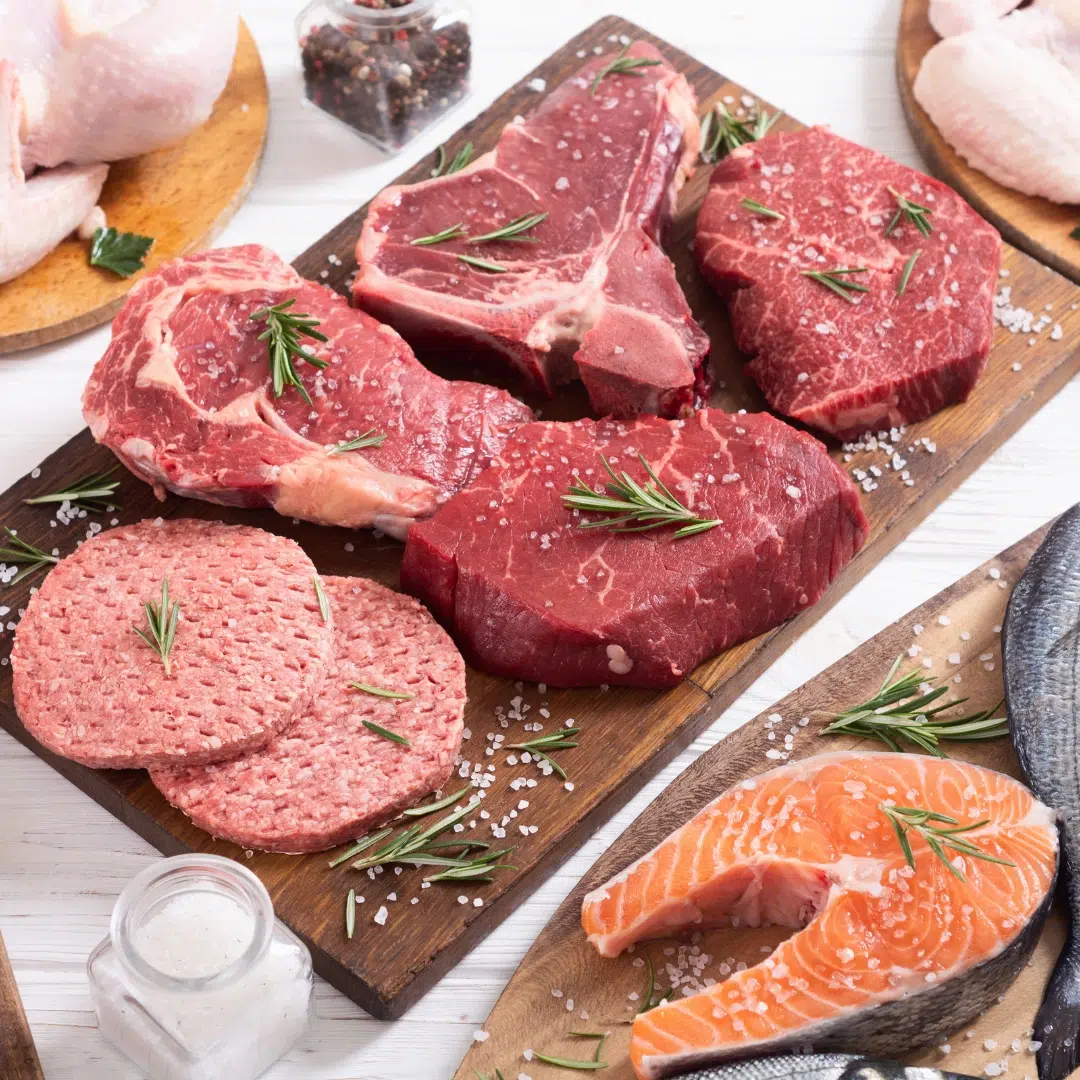 Clean proteins plate with wild salmon and lean, hormone-free meats to supply amino acids for detox and balanced hormones.